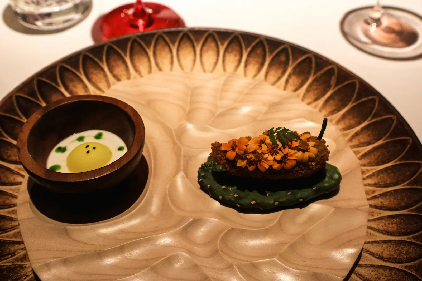 Artfully plated fine dining dish at FLO Lagos
